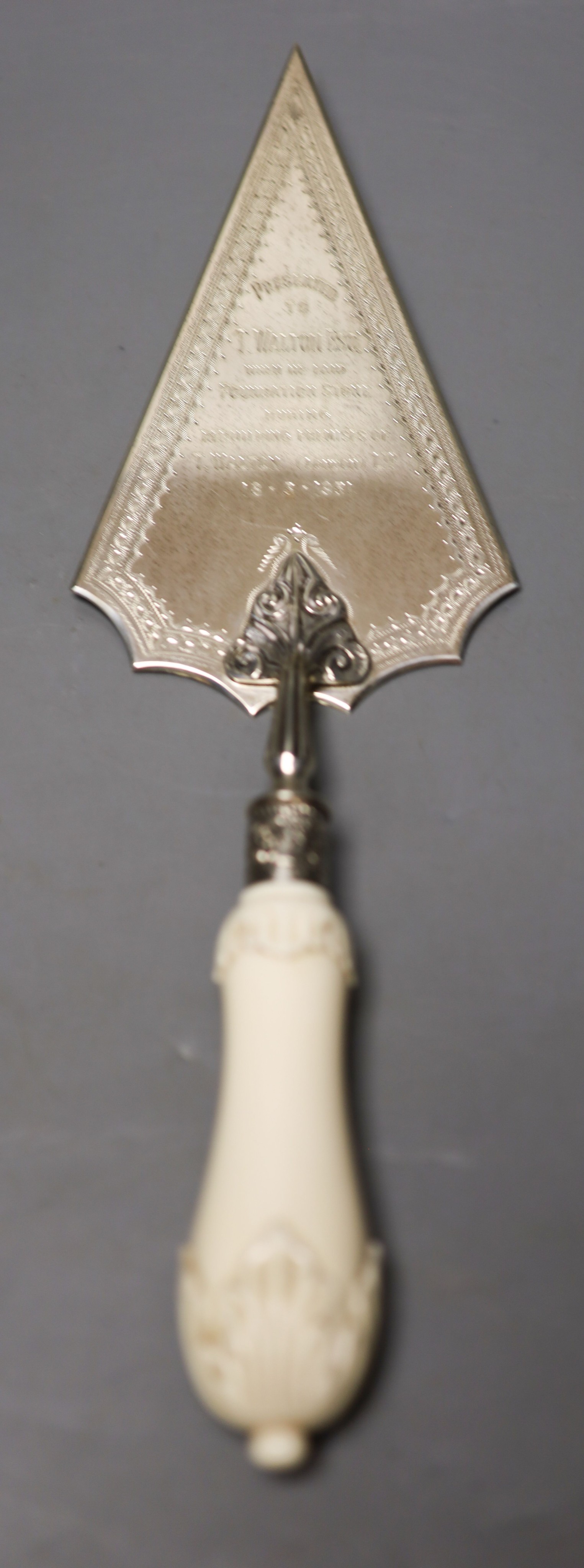 A George V ivory handled silver presentation trowel, with engraved inscription. London, 1928, 33cm, gross weight 8.5oz.